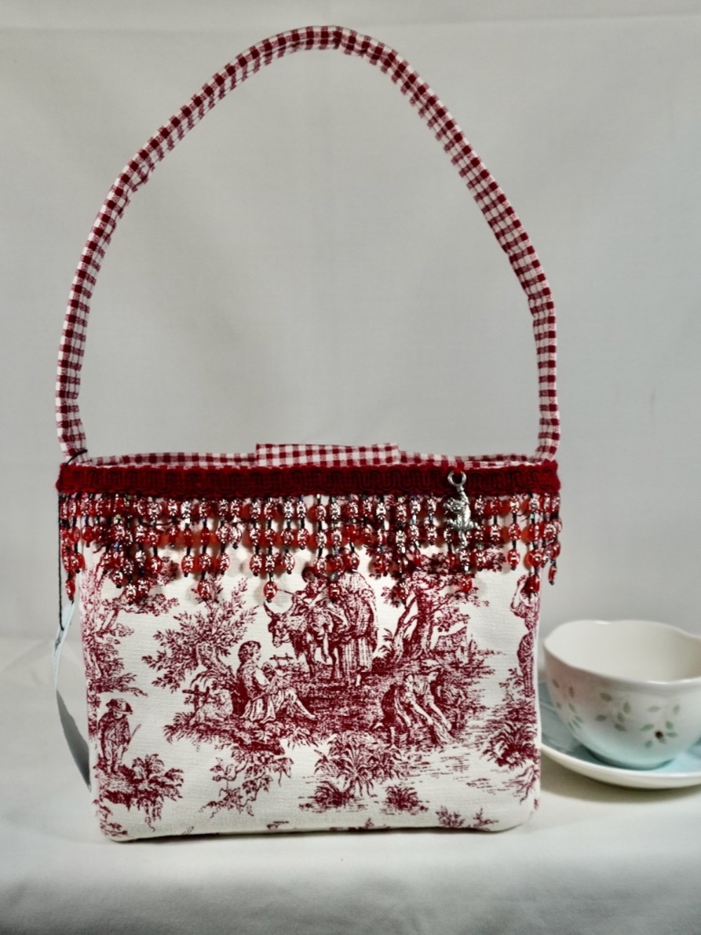 Elegant ivory and burgundy vintage handmade hand bag.